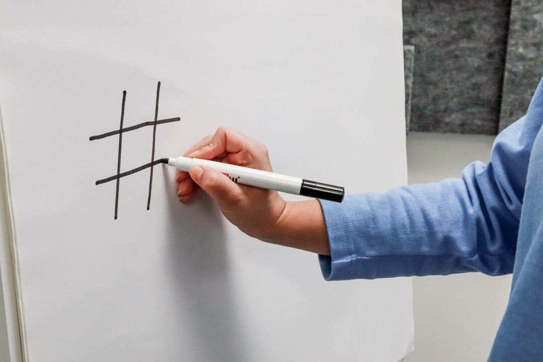 Business professionals presenting a strategy on a whiteboard in a meeting room