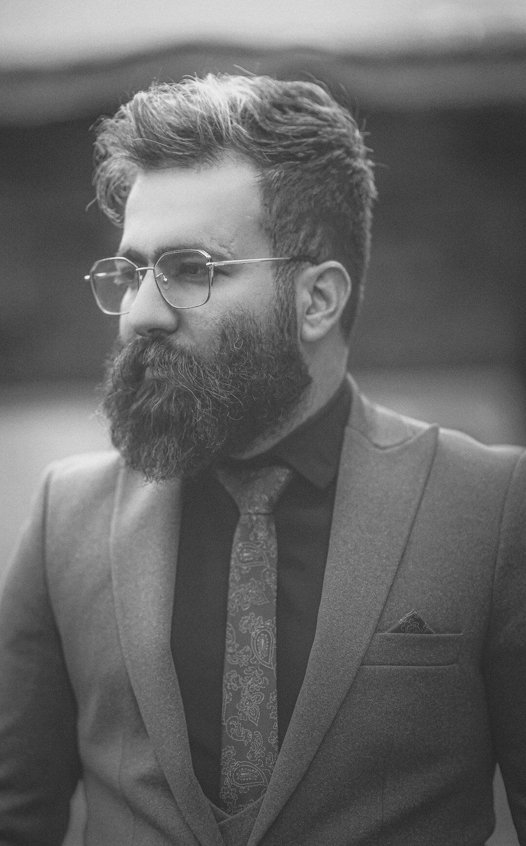Studio portrait of a Danish businessman with beard and glasses